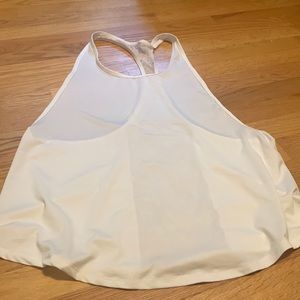 White racer back tank top with lace details on back. Size medium.